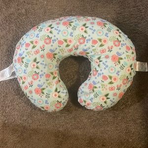 Boppy pillow for help with feeding babies or holding babies.